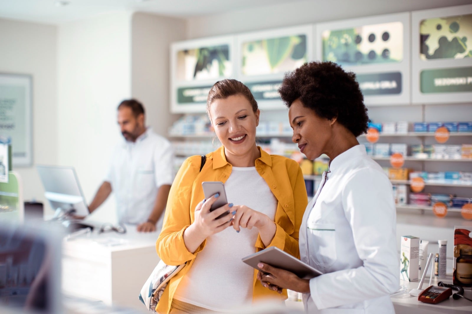 Pharmacist helping a customer